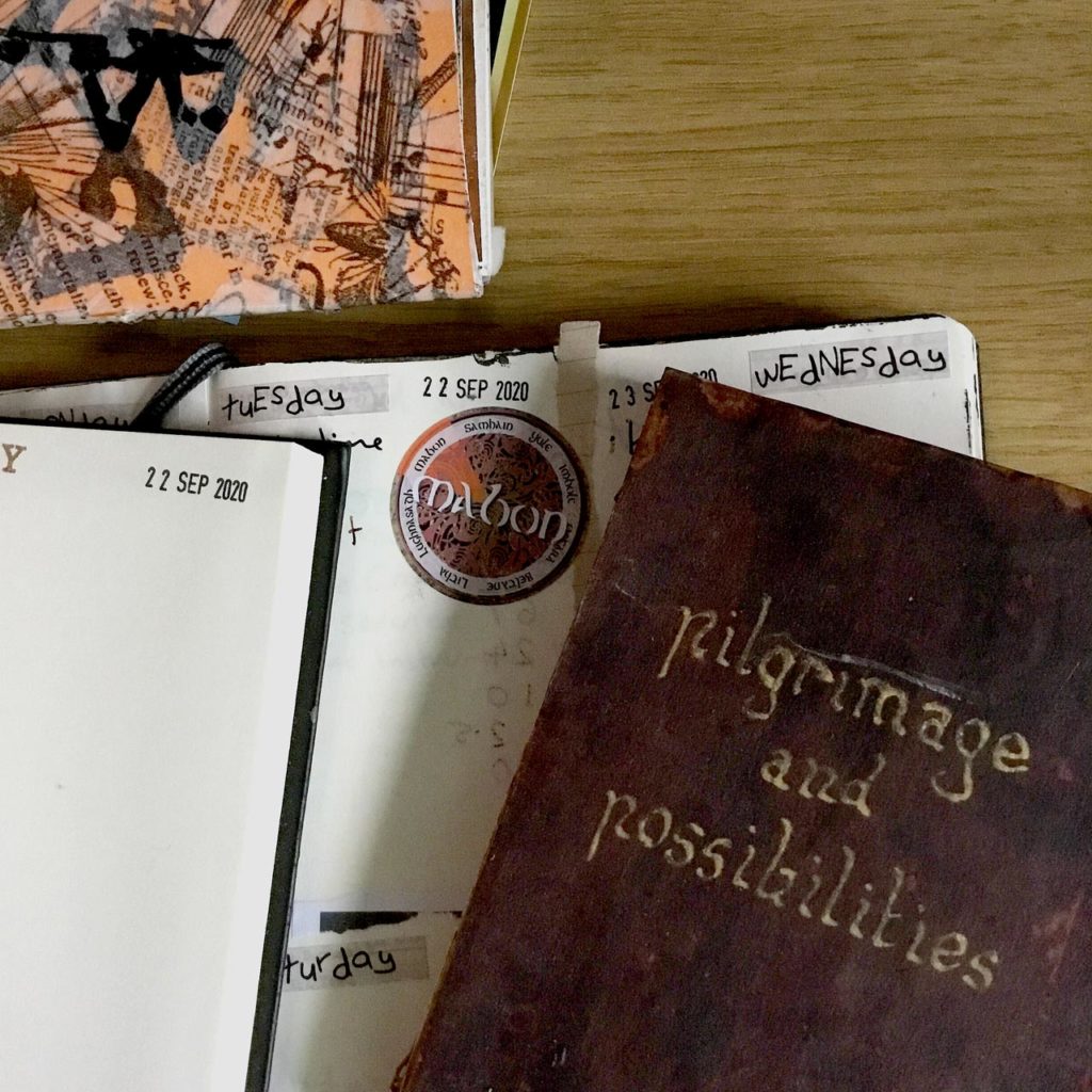 Mabon sticker in my journal with my other journals