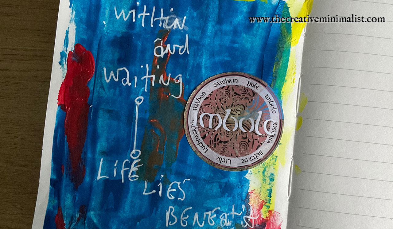 imbolc journal page with the words within and waiting, life lies beneath