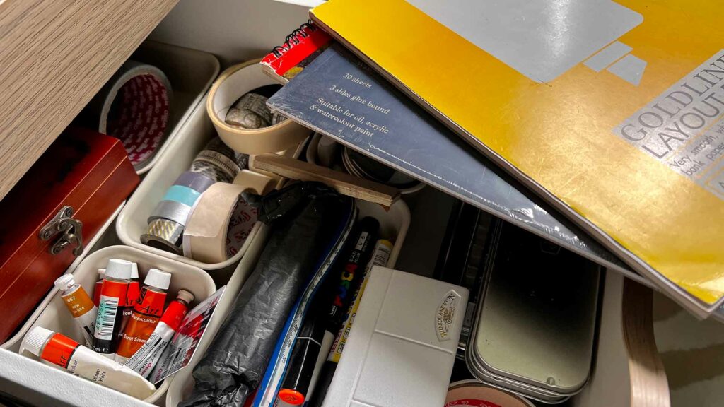 Messy desk drawer