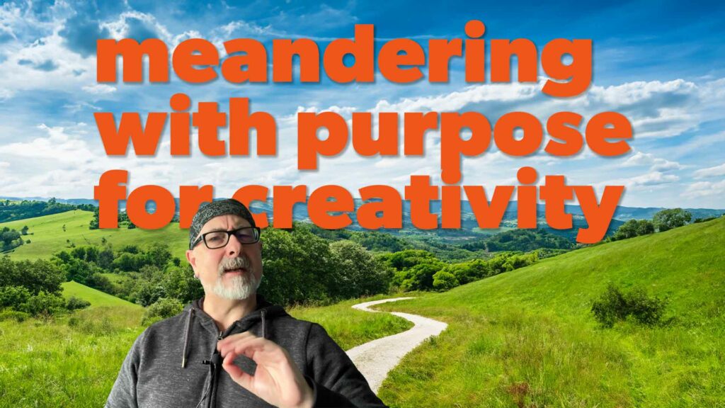 meandering with purpose for creativity text with and image of me infant of some AI generated hills