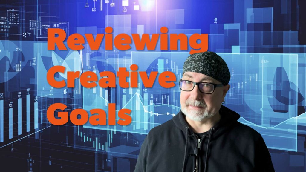 reviewing creative goals text with an image of me in front of abstract charts